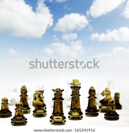Chess game in front of blue sky