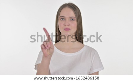 Portrait of Beautiful Young Woman saying No with Finger Sign