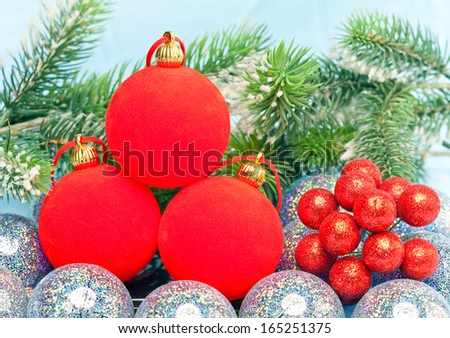 Red New Year's ball, decorative berries 