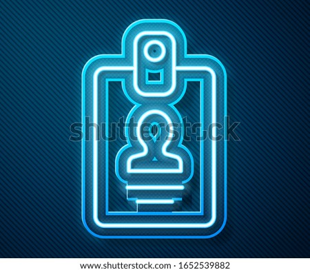 Glowing neon line Identification badge icon isolated on blue background. It can be used for presentation, identity of the company, advertising.  Vector Illustration