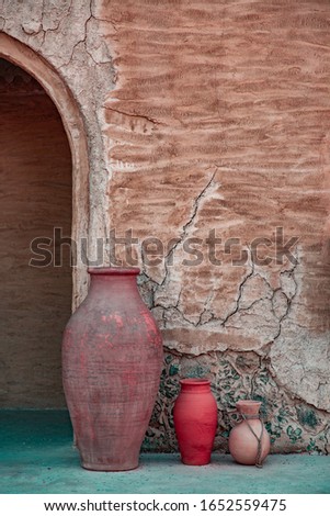 Mud Clay Pots Traditional Arab Historical Emirati Vintage wall Background 