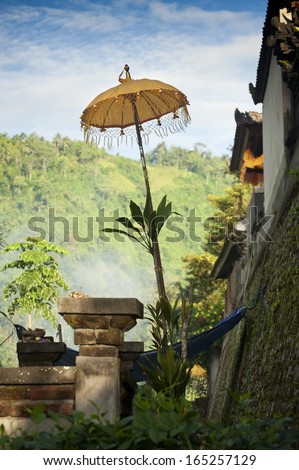 Balinese Temple Umbrella. Decorative Balinese umbrellas can be seen all over the island at temple ceremonies and other Hindu religious events.