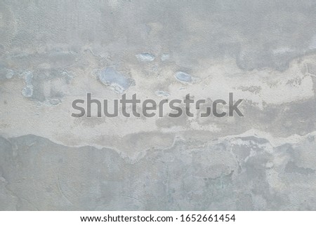  White and Grey old age dirty obsolete Cement blick wall stone  Masonry  with rough  surface abstract  peeling shabby cracked damaged  plaster mortar space for  textured  background close up.
