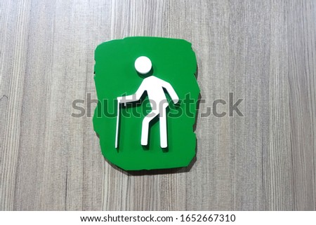 Man toilet sign in public washroom toilet