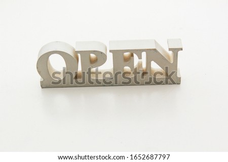 white color "open" wooden sign board.
