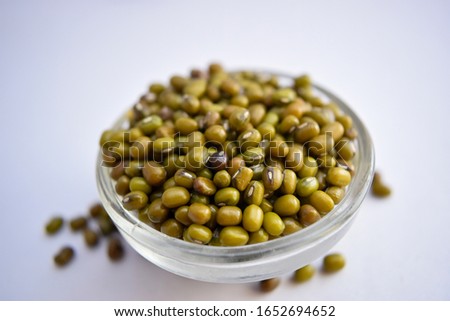 Mung Beans in A Glass Bowl on White Background Close-Up Stock Photograph Image