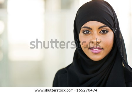 beautiful muslim businesswoman in modern office Royalty-Free Stock Photo #165270494