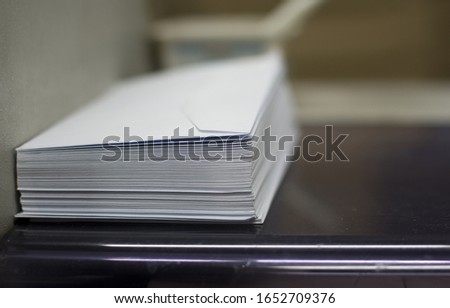 a pile of white paper envelopes Royalty-Free Stock Photo #1652709376