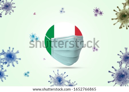 Coronavirus / Corona virus concept. Italy put mask to fight against Corona virus. Concept of fight against virus. Many Virus attack isolated on blue background.