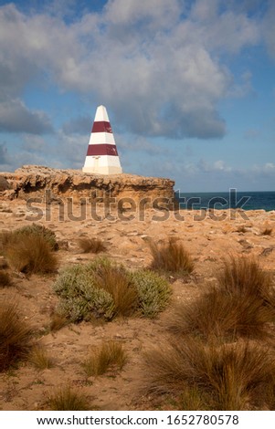 Obelisk on the coast in  Robe. This  is a town and fishing port on the South East Limestone Coast of South Australia. 