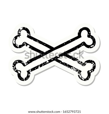 distressed sticker tattoo in traditional style of cross bones