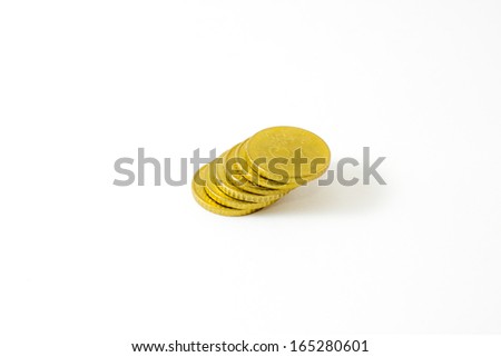 Heap of gold coins. On a white background.