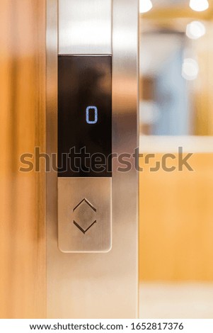 Close up of elevator digital display with buttons. Space for copy.