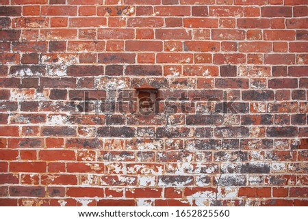 texture of old red brick masonry