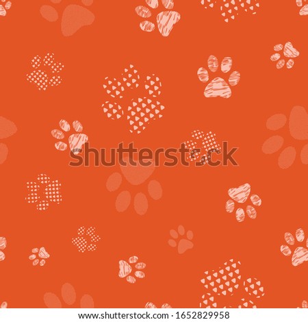 Complex vector illustration print in coral and cream. Seamless pattern with cats and dogs paw prints isolated from background. Perfect for gifts, wallpaper, fabric and scrapbooking.