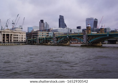 London, UK: view of London Bridge and buildings of the City 