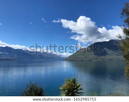 Queenstown New Zealand picture of lake and mountain taken from a height