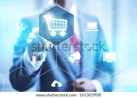 Online shopping business concept selecting shopping cart Royalty-Free Stock Photo #165303908