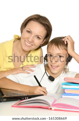 Mother and son studying together
