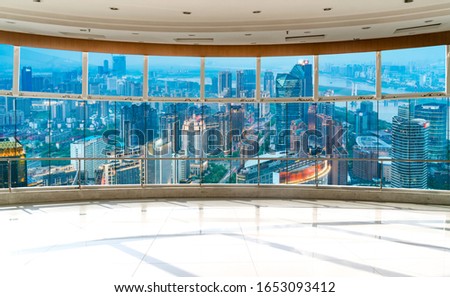 Office building glass and city skyline