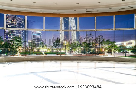 Office building glass and city skyline