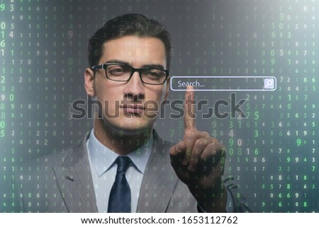 Search concept with businessman pressing button