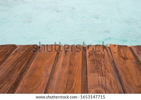 Wood plate with water surface  background