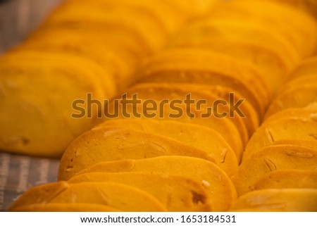 Close-up of crispy golden Cookies. Yummy cookies Picture with soft light. Biscuit, dessert, Baked snacks. Shallow depth of field.