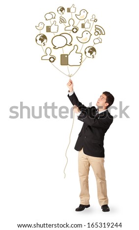 Attractive happy man holding social icon balloon