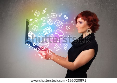 Beautiful young woman holding notebook with colorful hand drawn multimedia icons