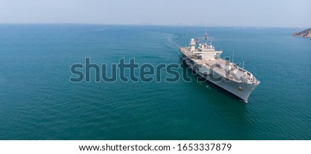 Nuclear battle ship, Military navy ship carrier  patrol around port. Royalty-Free Stock Photo #1653337879