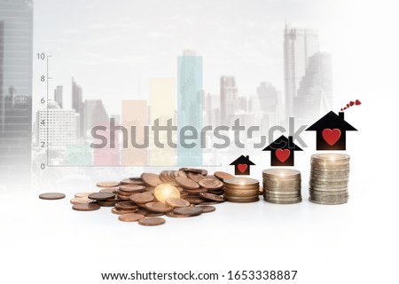 Step of coins stacks with house and graph icons on building background .Saving and investment or family planning concept.