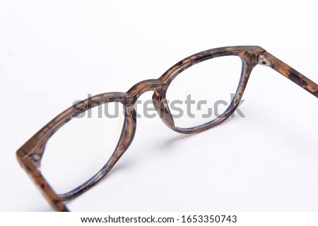 Leopard print glasses on a white background