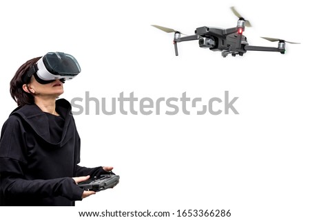 woman spy in 360 virtual reality headset playing game with drone isolated on white background. 3D device gadget for watching movies for travel and entertainment in 3d space. Cardboard VR AR glasses