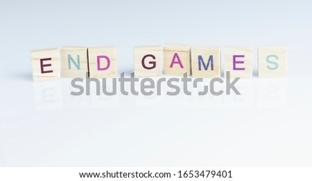 END GAMES sign made of wooden letters block isolated on white background