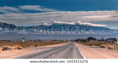 Picture of Road with moutains in background