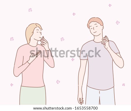 Woman and man using perfume on pink background. Hand drawn style vector design illustrations.