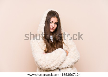 Young caucasian woman posing isolated unhappy looking in camera with sarcastic expression.