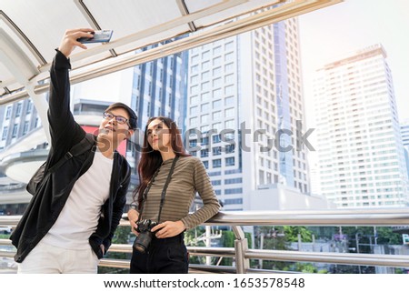 Good Moments, Happy love couple of tourists taking selfie in urban city