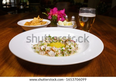 Plate of shrimp aguachile with green sauce