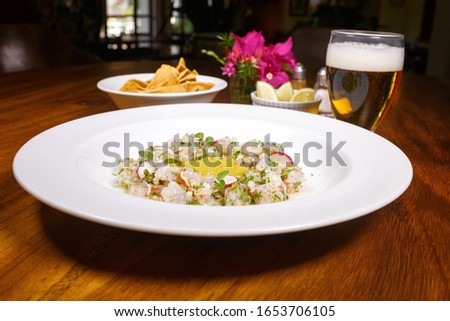 Plate of shrimp aguachile with green sauce