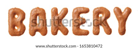 Word bakery made of real cookies, isolated on white