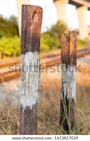 Close-up photos of old wooden posts