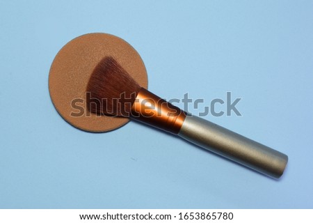Foundation and cosmetic brushes seen from above.
