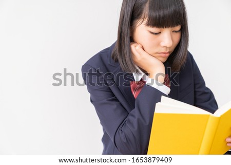 asian girl who reads a book,School uniform,