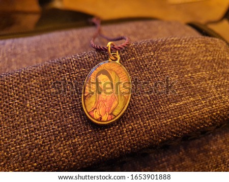 necklace of the virgin of guadalupe Royalty-Free Stock Photo #1653901888
