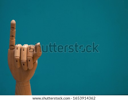image of a wooden Little finger  or touching isolated on a  background clipping path