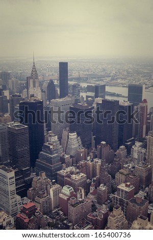 NYC downtown and sky. Vintage looking image. New York City Skyline Aerial View vanishing point in fog