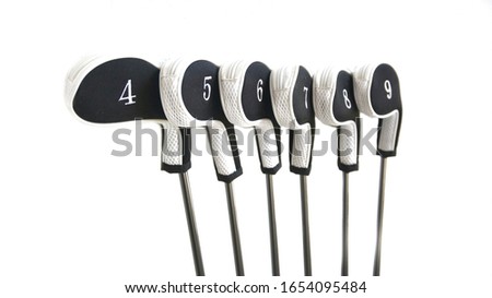 Image of golf iron set from iron 4 to iron 9 with head cover isolated on white background