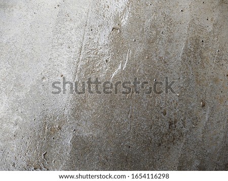 texture and background of wet and dirty concrete after rain